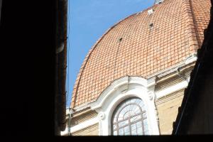 a roof of a building with a window on it at Palazzo D'Ambra Residenza d'Epoca in Florence