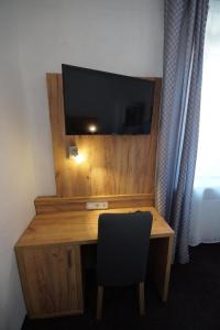 TV a/nebo společenská místnost v ubytování Hotel Fischertor