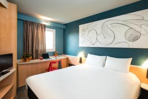 Postel nebo postele na pokoji v ubytování Hotel ibis Narbonne