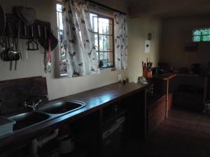 Kuchyň nebo kuchyňský kout v ubytování Hippo Retreat & Tiger Fishing Komatipoort + 46 fotografií