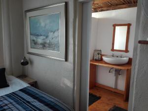 Postel nebo postele na pokoji v ubytování Hippo Retreat & Tiger Fishing Komatipoort