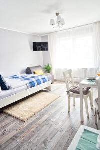 Posteľ alebo postele v izbe v ubytovaní Morning Star Apartments + 17 fotografií