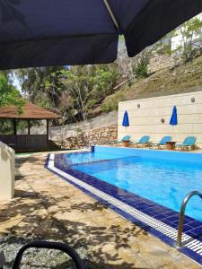 The swimming pool at or close to Sfinias Apartments