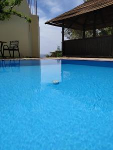 The swimming pool at or close to Sfinias Apartments