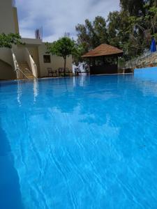 The swimming pool at or close to Sfinias Apartments