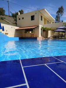 The swimming pool at or close to Sfinias Apartments