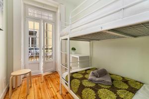 Uma ou mais camas em beliche em um quarto em Bicaense Apartments