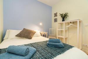 Cama ou camas em um quarto em Bicaense Apartments