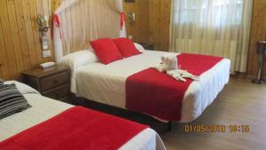Łóżko lub łóżka w pokoju w obiekcie Hotel Playa Samil Vigo