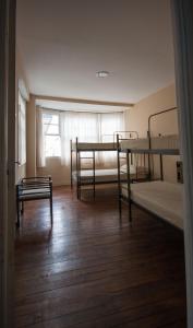 Łóżko lub łóżka w pokoju w obiekcie CASA PELTRE