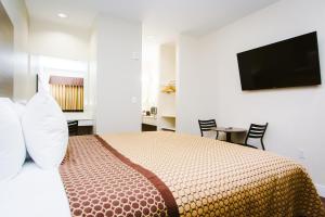 Katil atau katil-katil dalam bilik di scottish inn & suites