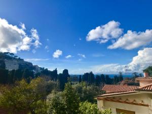 a view of the hills from a house at Appartamento Sorrento Sunrise in Sorrento
