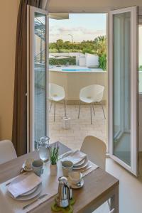 Balkón alebo terasa v ubytovaní Travini Hotel Residence