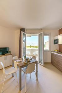 Kuchyňa alebo kuchynka v ubytovaní Travini Hotel Residence