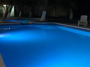Bazén v ubytování Nichos Beach Villas nebo v jeho okolí