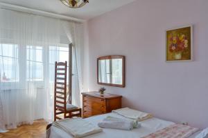 Postel nebo postele na pokoji v ubytování Apartment Kata