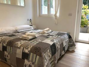 En eller flere senge i et værelse på Country House Tagliaferro