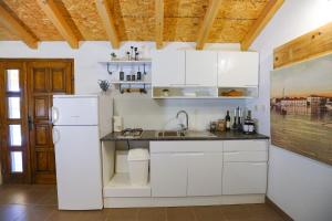 Kuchyň nebo kuchyňský kout v ubytování Holiday house Dalma