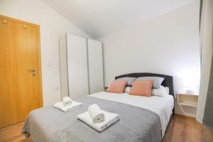 Postel nebo postele na pokoji v ubytování Holiday house Dalma