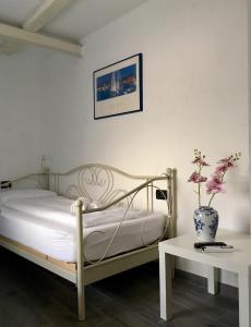 Posteľ alebo postele v izbe v ubytovaní Plaza Stone Apartment