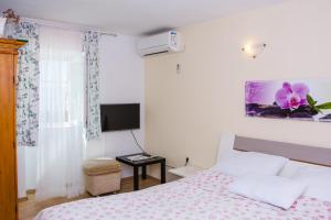 Postel nebo postele na pokoji v ubytování Apartment Kata