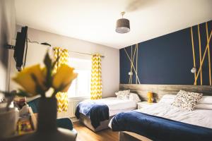 Giường trong phòng chung tại Kerrigan's B&B