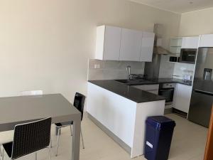 Kuchyň nebo kuchyňský kout v ubytování WATERFRONT FLAT