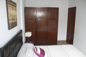 Postel nebo postele na pokoji v ubytování Tu Casa En Frontera
