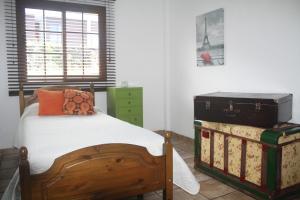 Postel nebo postele na pokoji v ubytování Tu Casa En Frontera