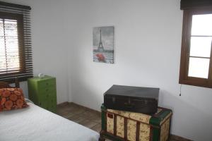 Postel nebo postele na pokoji v ubytování Tu Casa En Frontera
