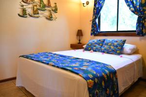 Letto o letti in una camera di West Bay Lodge and Spa