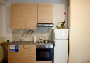 A kitchen or kitchenette at Basement Turati 3 -Consulates District