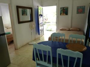 Ένα ή περισσότερα κρεβάτια σε δωμάτιο στο Casitas La Playa