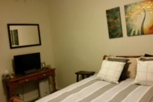 Cama o camas de una habitación en Self-contained Private 2 Bedroom Apartment