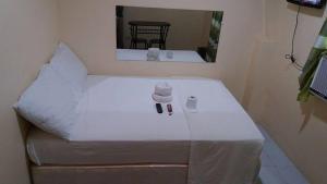Letto o letti in una camera di Lei Kendee