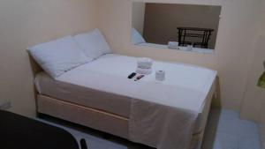 Letto o letti in una camera di Lei Kendee