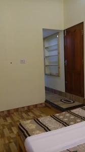 Postel nebo postele na pokoji v ubytování Aldos Ark Home Stay