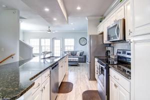 a kitchen with white cabinets and a counter top at Pathway 14838 in Padre Island