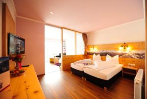 Letto o letti in una camera di Hotel Gasthof Zum Schwanen