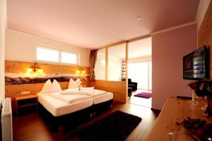 Letto o letti in una camera di Hotel Gasthof Zum Schwanen