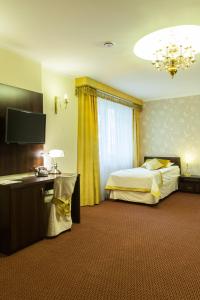 
Łóżko lub łóżka w pokoju w obiekcie Hotel Ostrawa
