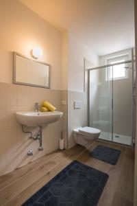 Kúpeľňa v ubytovaní Albergo Diffuso ELA Living - Design Apartment & Room + 36 fotografií