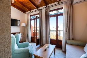 A television and/or entertainment centre at Phaedra Suites