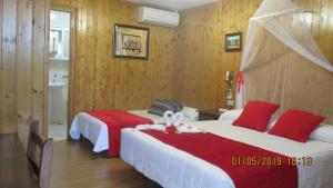 Łóżko lub łóżka w pokoju w obiekcie Hotel Playa Samil Vigo