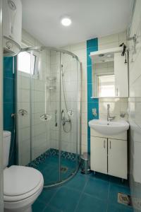 Ванна кімната в Apartments Natali