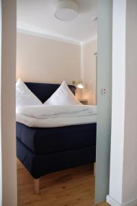 Llit o llits en una habitació de Apartment Torhaus Schloss Wocklum