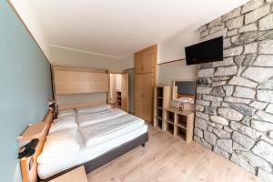 Postel nebo postele na pokoji v ubytování Hotel Bungalows Europa