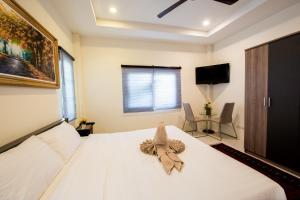 Ένα ή περισσότερα κρεβάτια σε δωμάτιο στο Aonang Private Villa - Private Pool & Garden +22 φωτογραφίες
