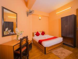 Rúm í herbergi á Hotel Premium