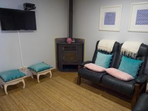 TV a/nebo společenská místnost v ubytování Quintinha de Labrujó